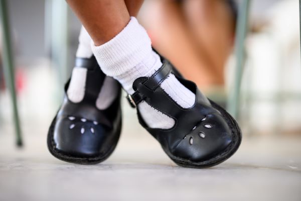 A school-girl's feet, socks and shoes 