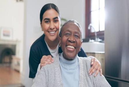 Care worker supporting vulnerable adult lady