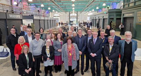 Cheshire East Council’s leader and deputy leader, councillors Sam Corcoran and Michael Gorman, Mayors Andy Burnham and Steve Rotheram, local councillors and businesses leaders at Crewe’s Market Hall.
