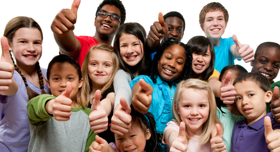 Group of children and young people with thumbs up 570 x 310