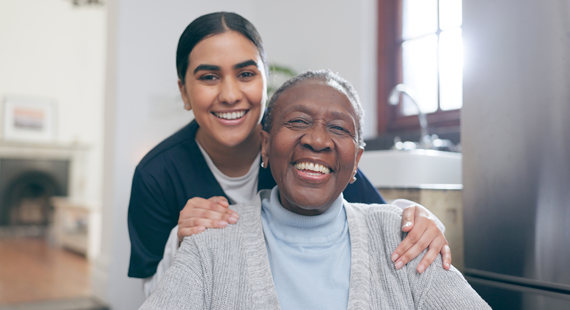 PA with senior black woman with disability in house 570 x 310