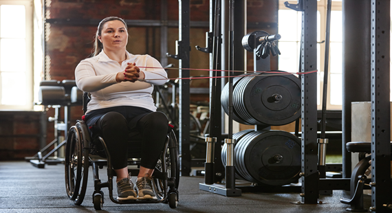 Woman with Disability Training with Elastic Bands 570 x 310